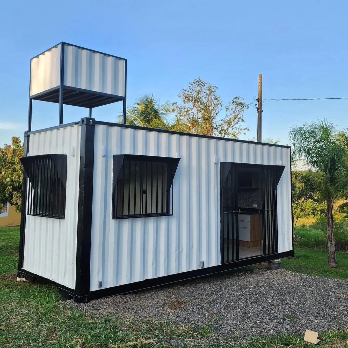 Custom-20ft-Shipping-Container-Home-With-Water-Tank-3